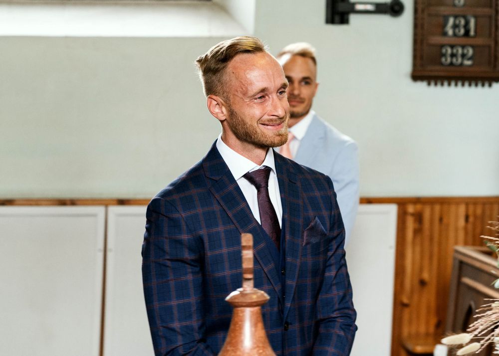 Joyful moment captured during church wedding ceremony.