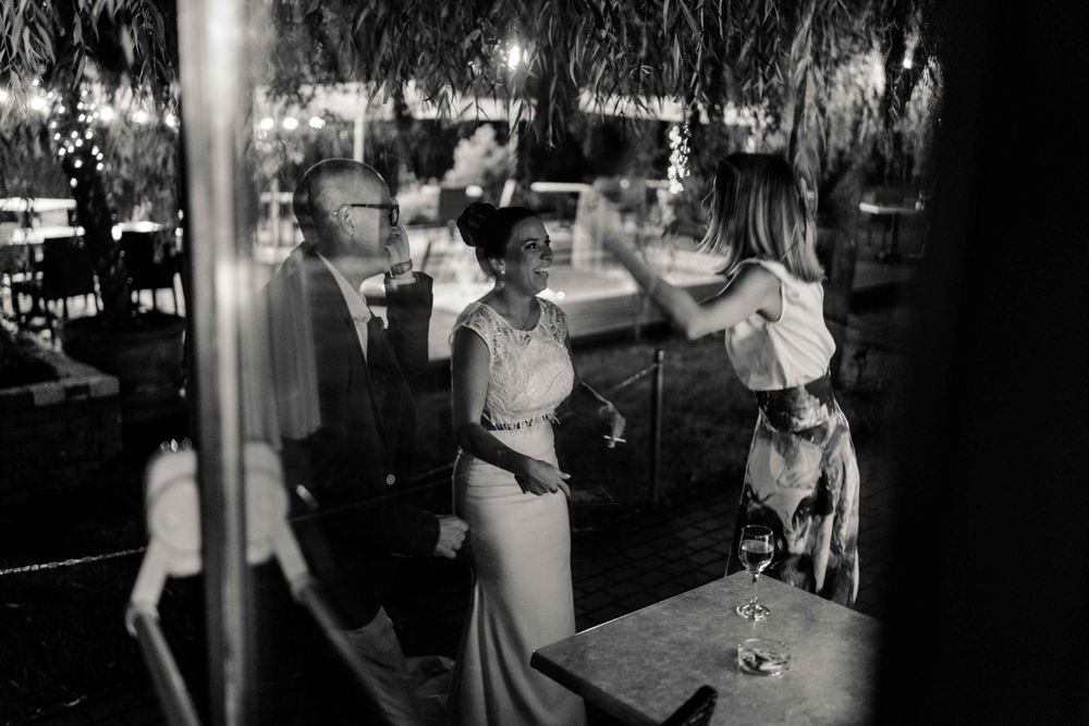 Vintage-style black and white photo of dancers in an elegant nightclub setting.