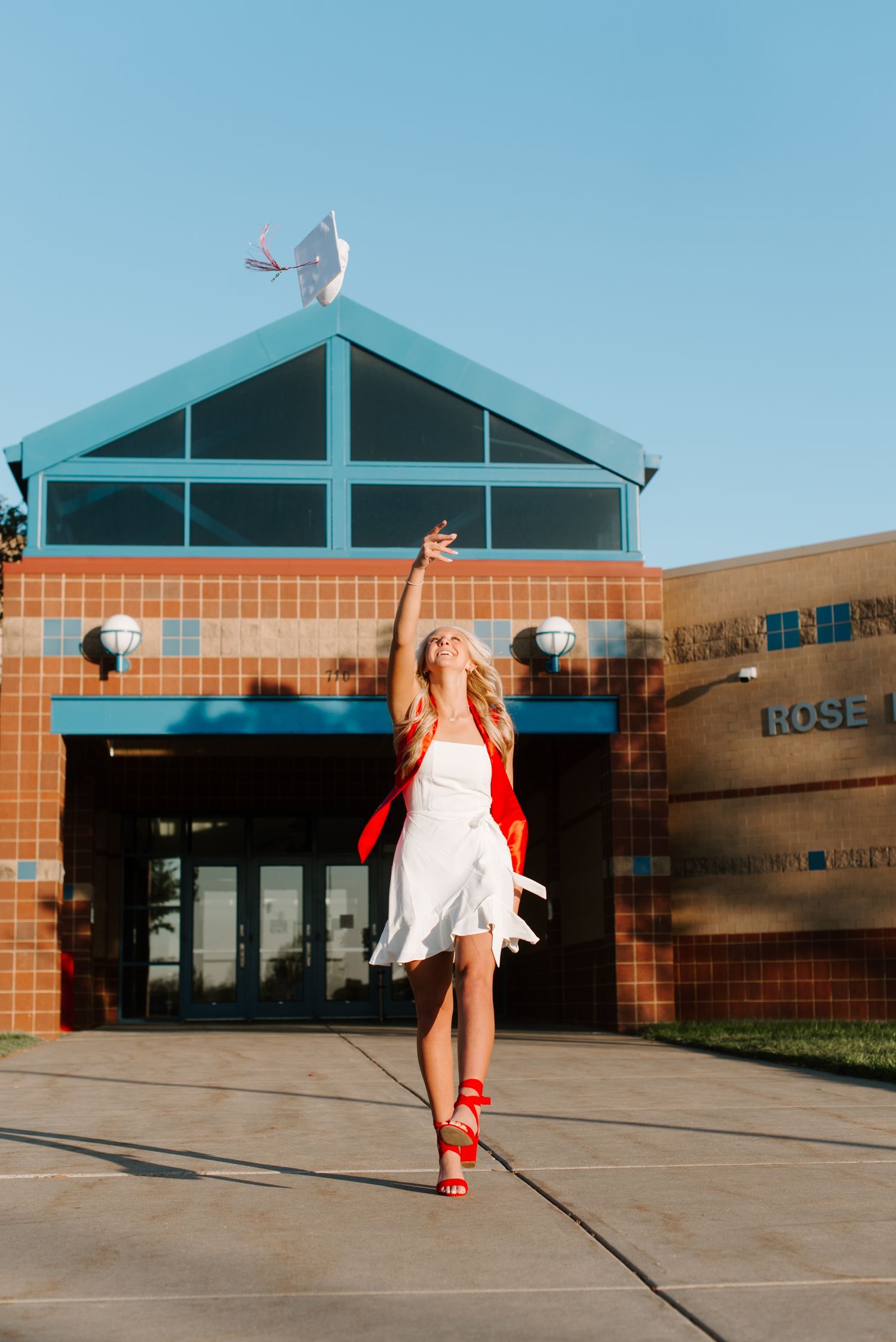 High school senior pictures with cap and gown at Rose Hill in Wichita KS Kansas