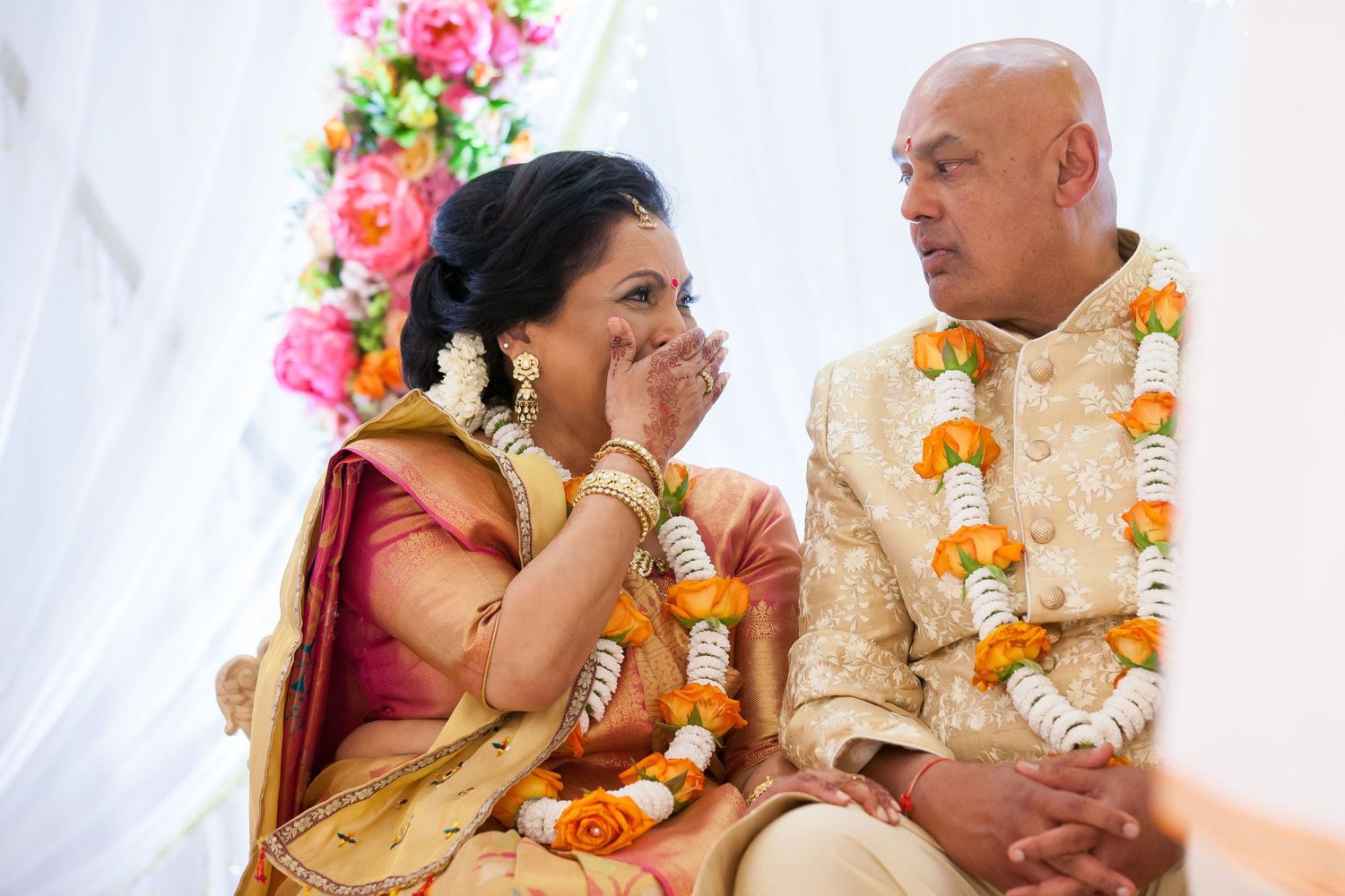 A very emotional moment for Roshni's mum as the parents anticipate their daughter entering as the bride at Oshwal Centre
