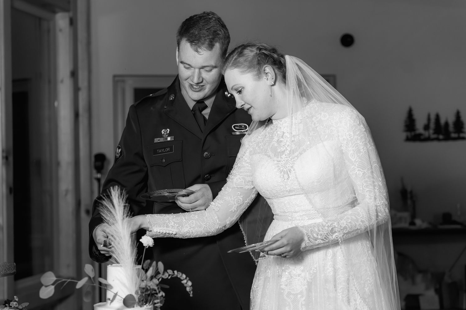 bride and groom cut the cake