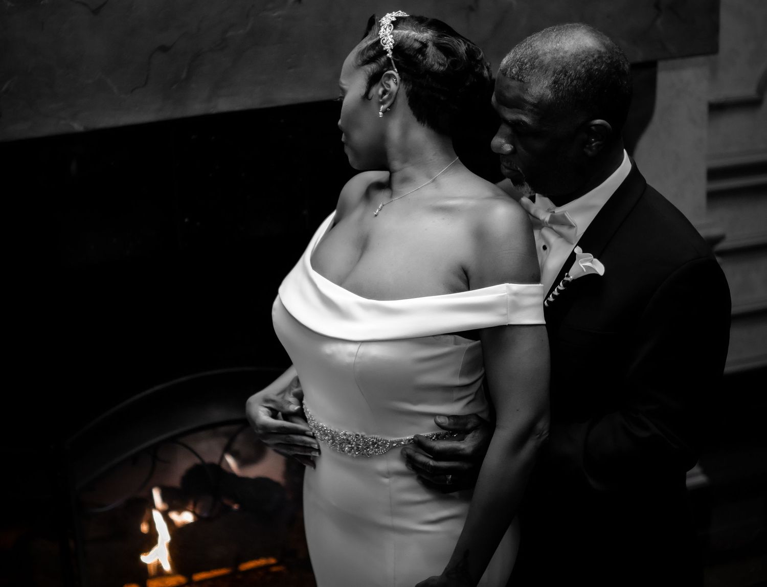 An intimate black and white portrait of a couple during their wedding celebration.