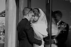 Black and white candid moments of a couple's intimate wedding celebration.
