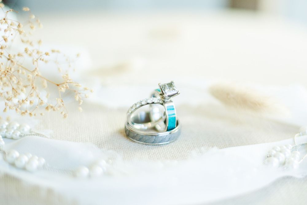 Close-up of delicate crystal decorations and wedding details in soft focus.
