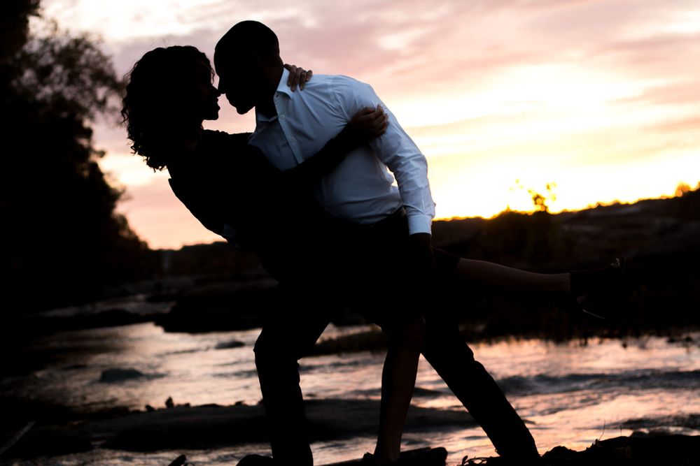 Silhouette of a couple at James River located in Richmond, VA.