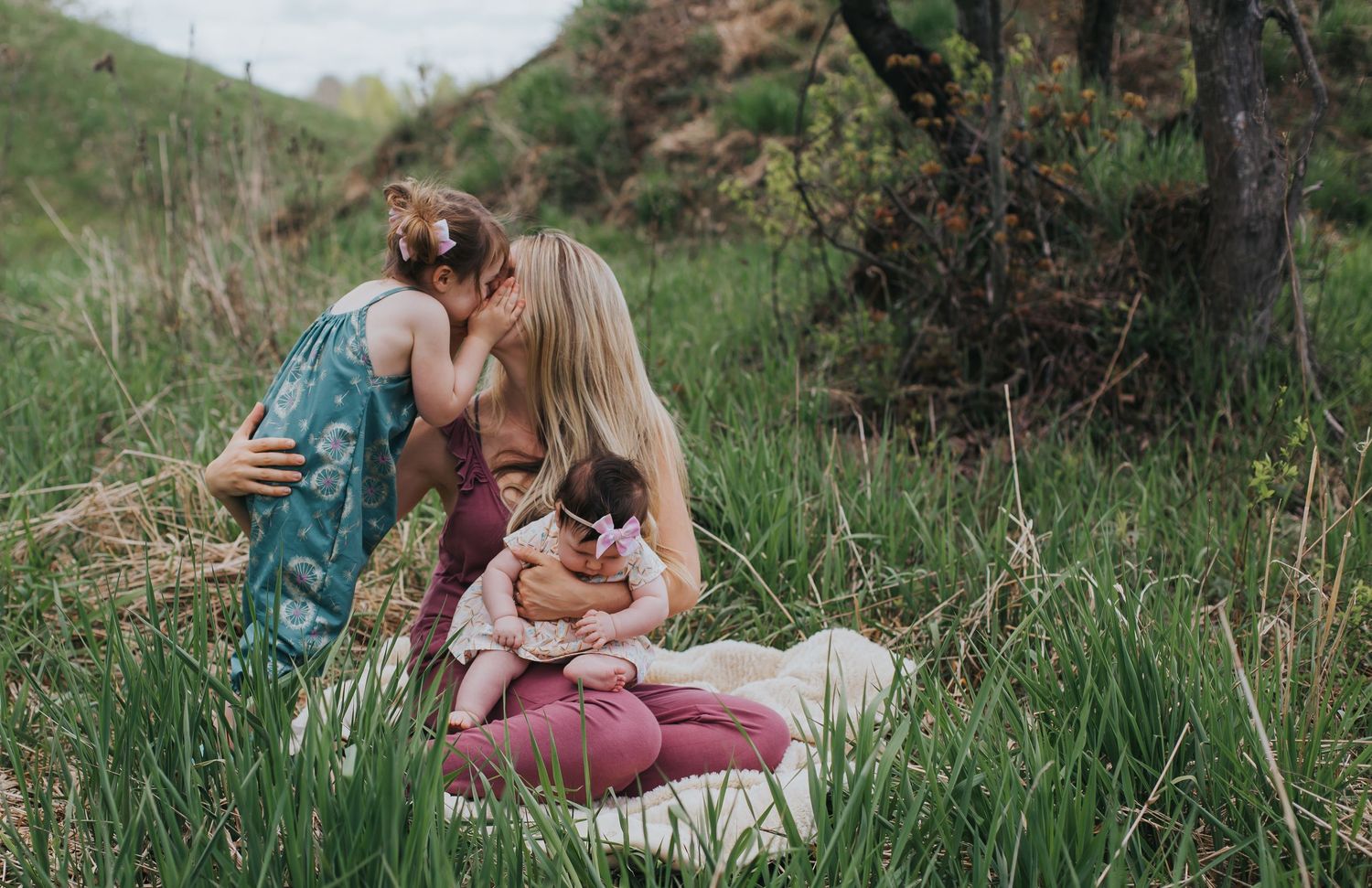 A portrait of a Beautiful mama with her two sweet girls by Alexis Anne Photography
