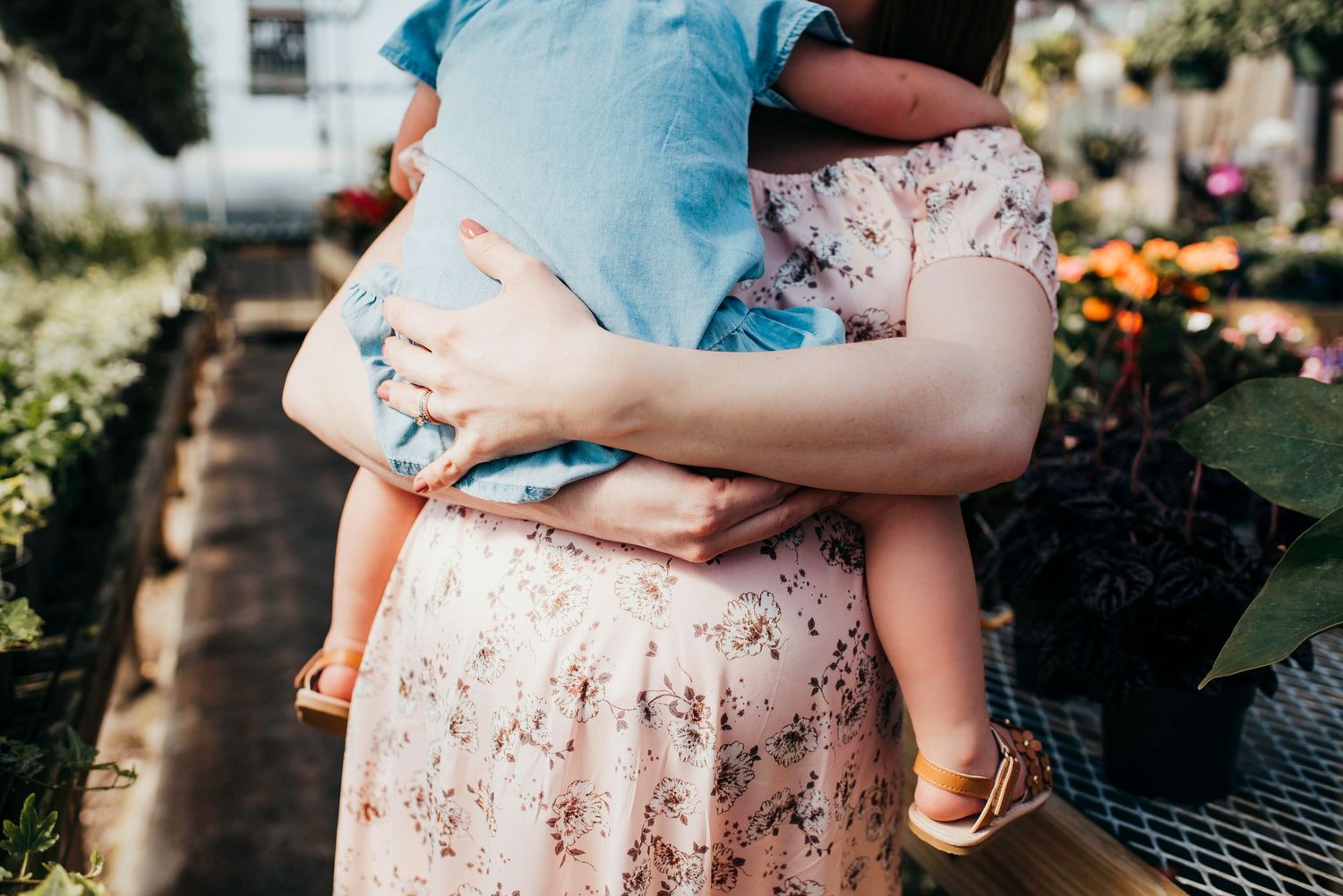 Farmington Maine Birth Photographer Mom holding daughter in arms
