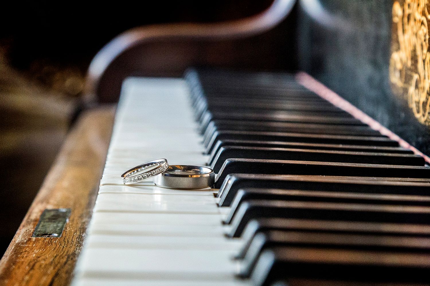 wedding rings together on a piano at Stanbrook abbey