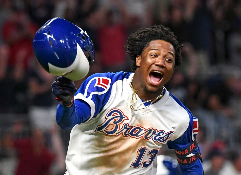 Atlanta Braves outfielder Ronald Acuna Jr. Celebrates a Walk-Off.