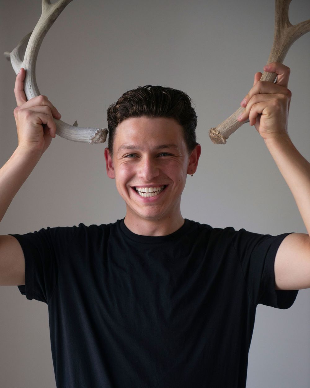 Male model, Ventura County Studio photographer, studio headshot, boy holding antlers