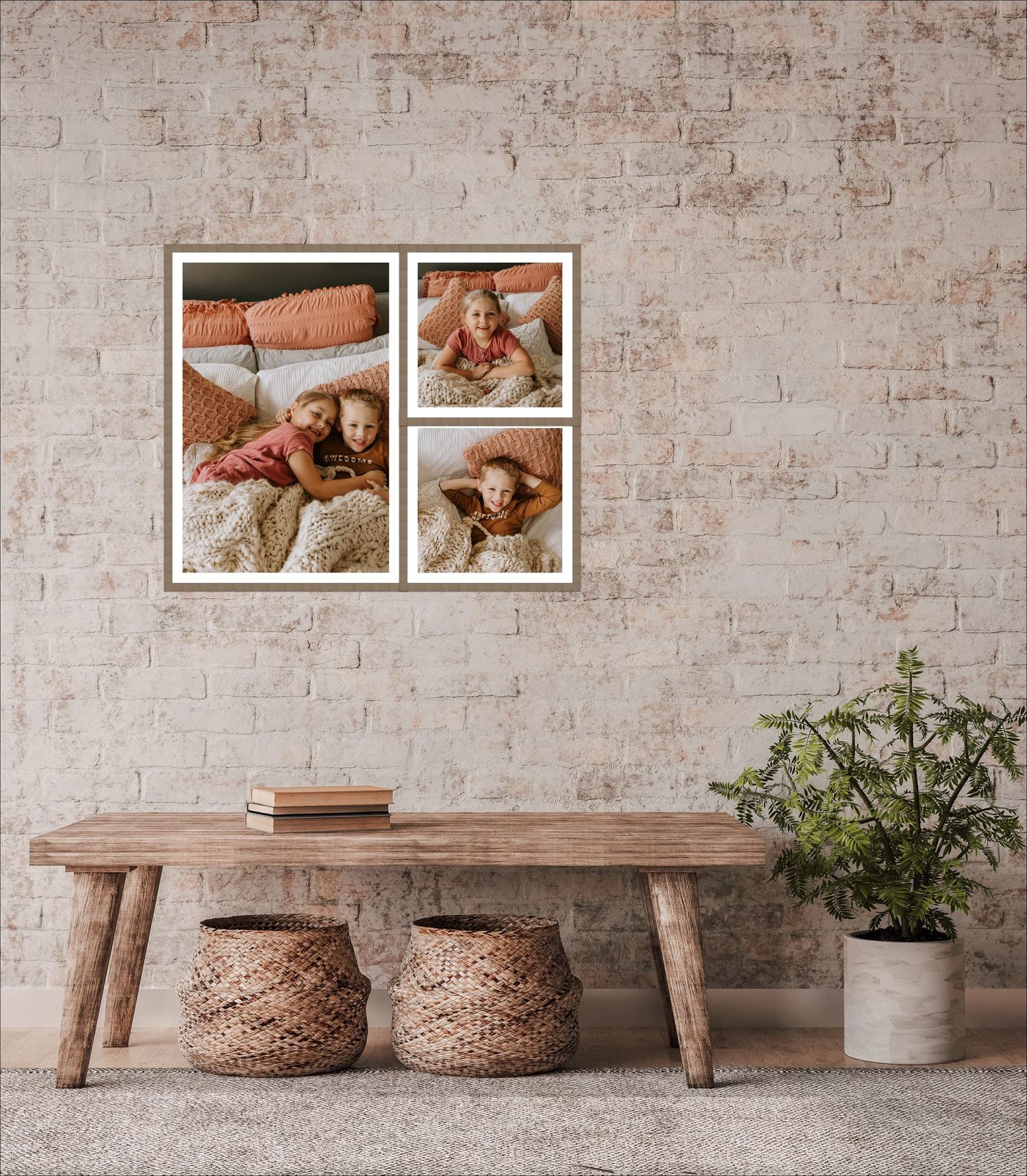 Rustic home decor display with wooden bench, woven baskets, and framed photos against exposed brick wall.