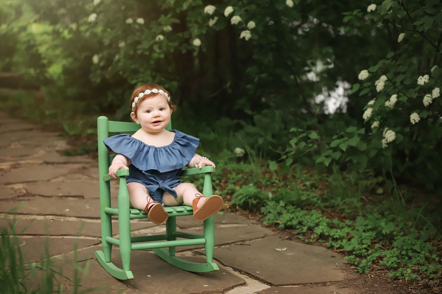 outdoor posed milestone portrait, one year portrait, rocking chair prop, spring time