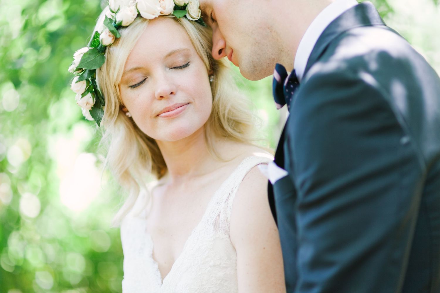 Romantic California wedding photo of couple with flower crown