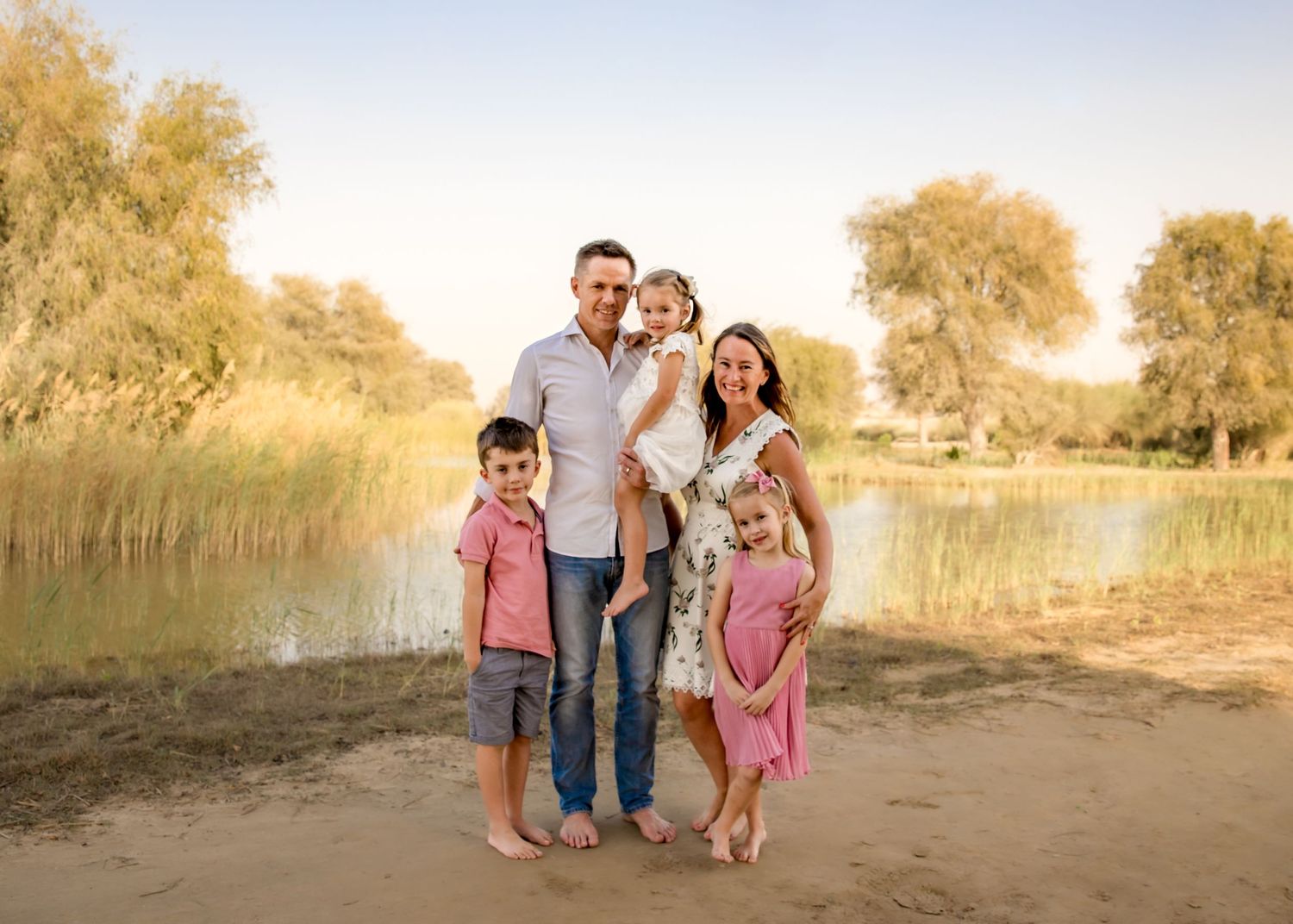 Family photoshoot at the lakes with white and pink clothing