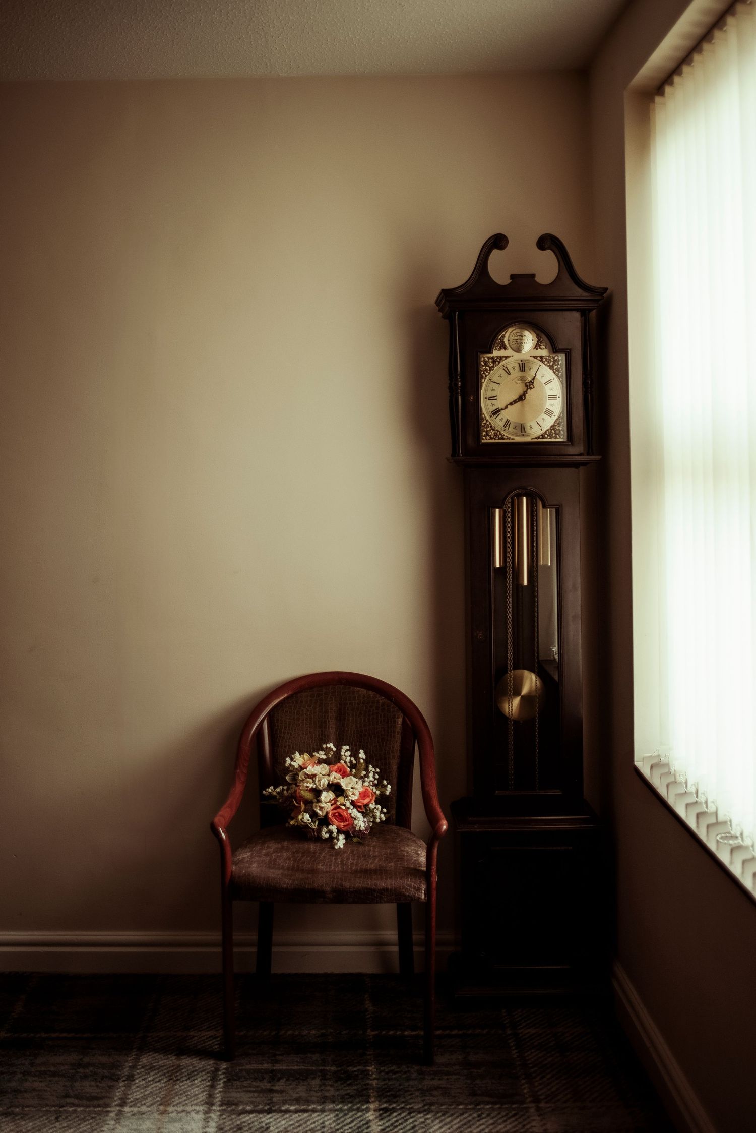artistic image of a bridal bouquet and a grandfather clock, sheffield wedding.