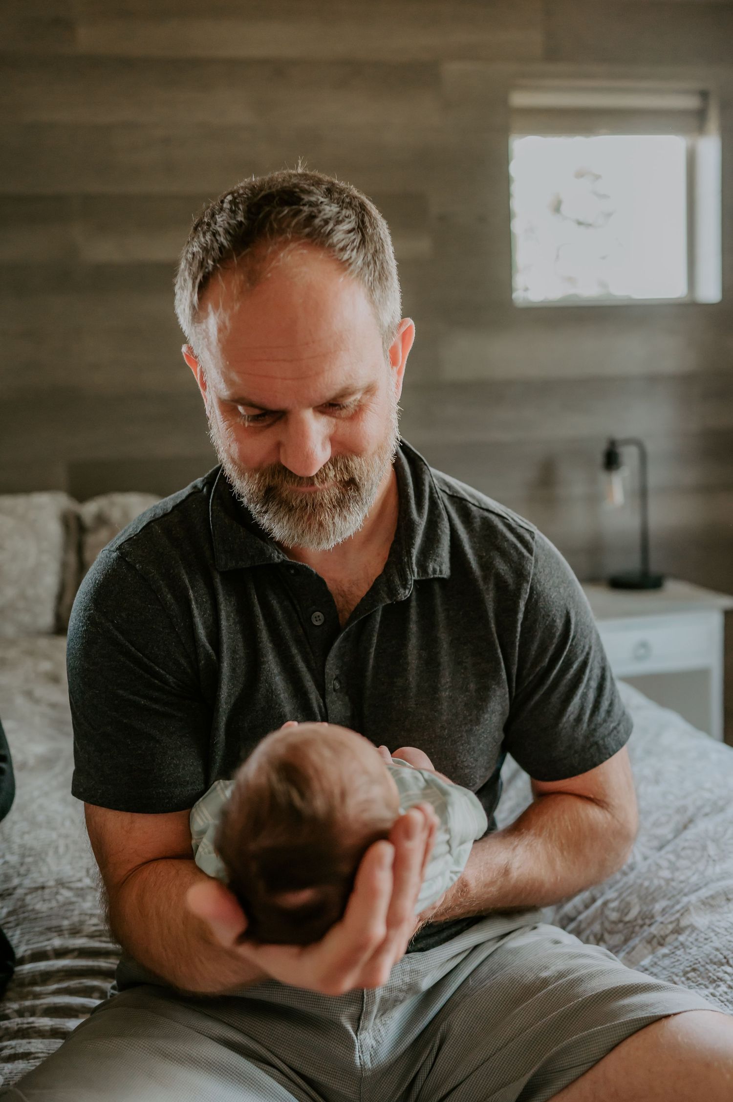 Father holds his baby