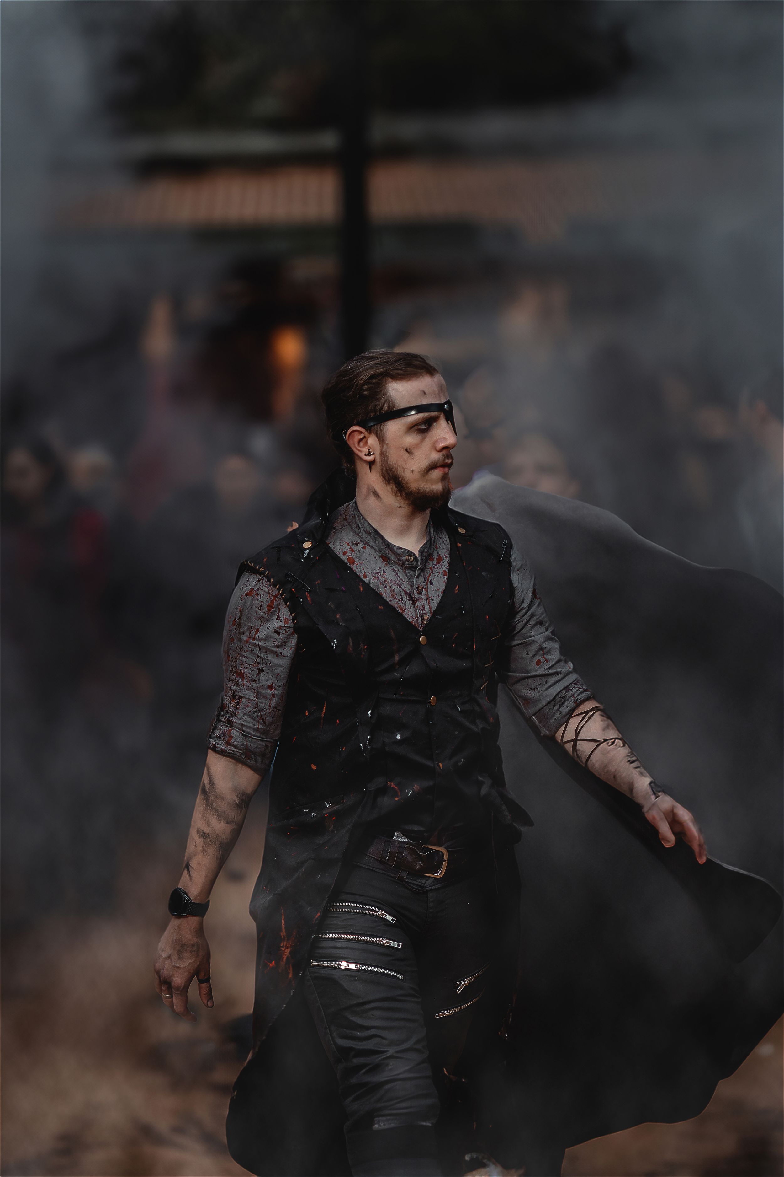 A dramatic portrait of a cosplayer in Victorian gothic attire emerging from smoke.