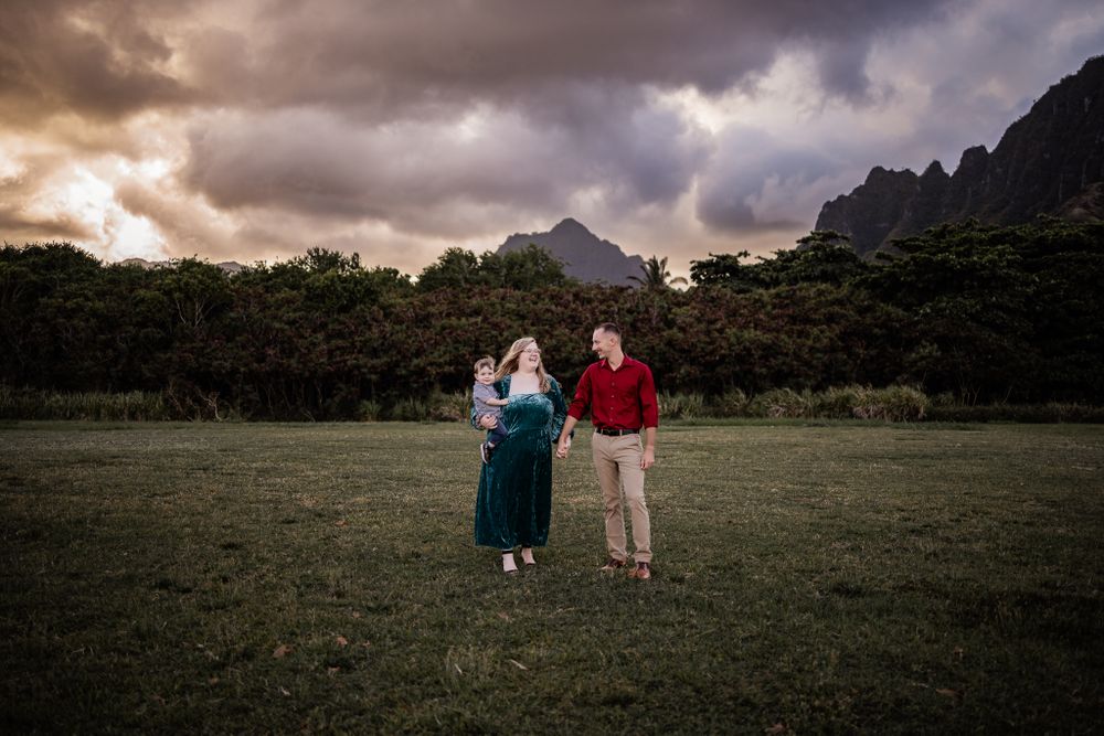 Dramatic mountain landscape portrait session at sunset in tropical setting.