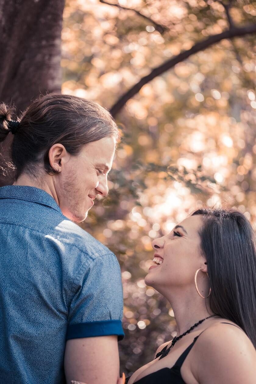 Couple in light and airy forest at the botanical gardens in forest