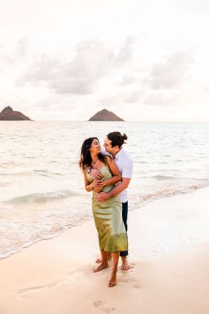Creative couples content session during golden hour in Lanikai Hawaii.