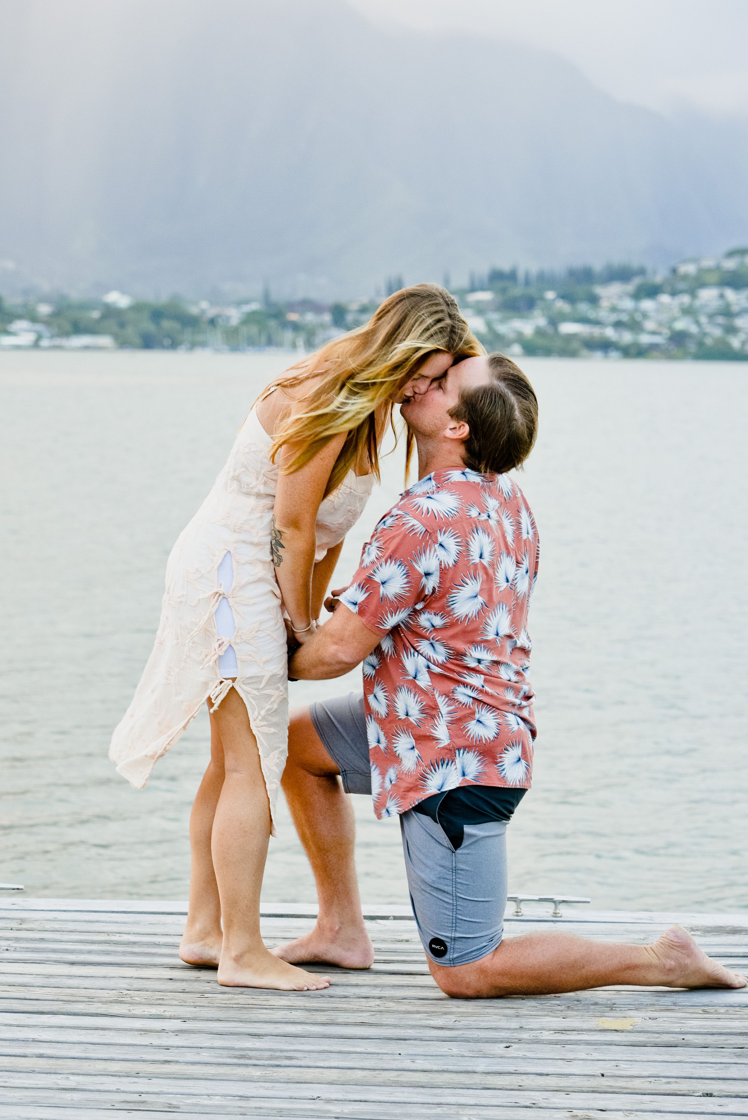 Surprise Kaneohe Yatch Club proposal with ocean backdrop in Oahu.