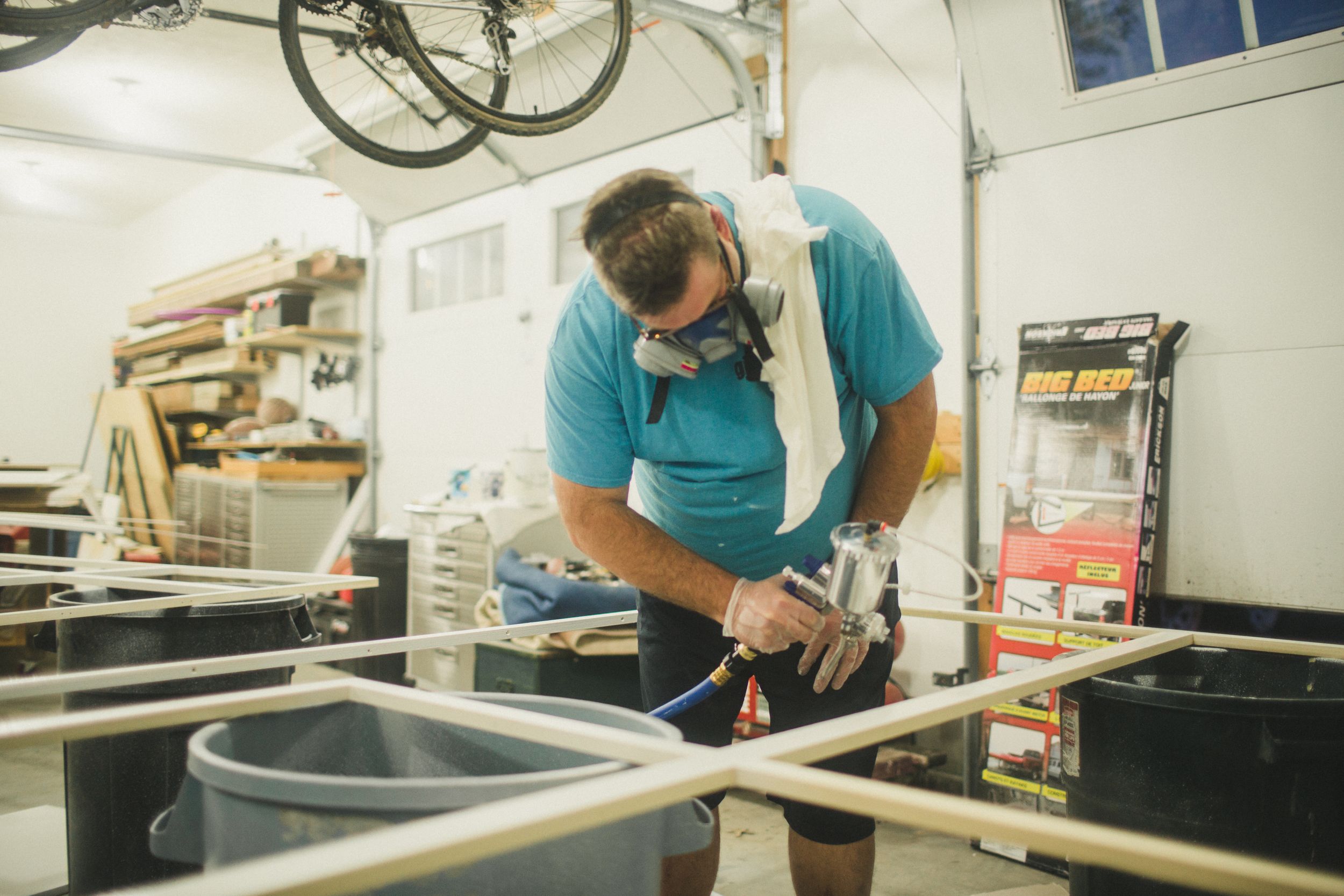 Workshop scene showing tools and equipment being used for bicycle repair and maintenance.
