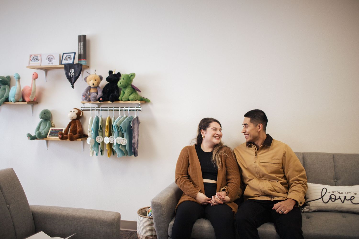 Everett branding photography: a couple in the waiting room at Wonder Baby Ultrasound Studio in Everett