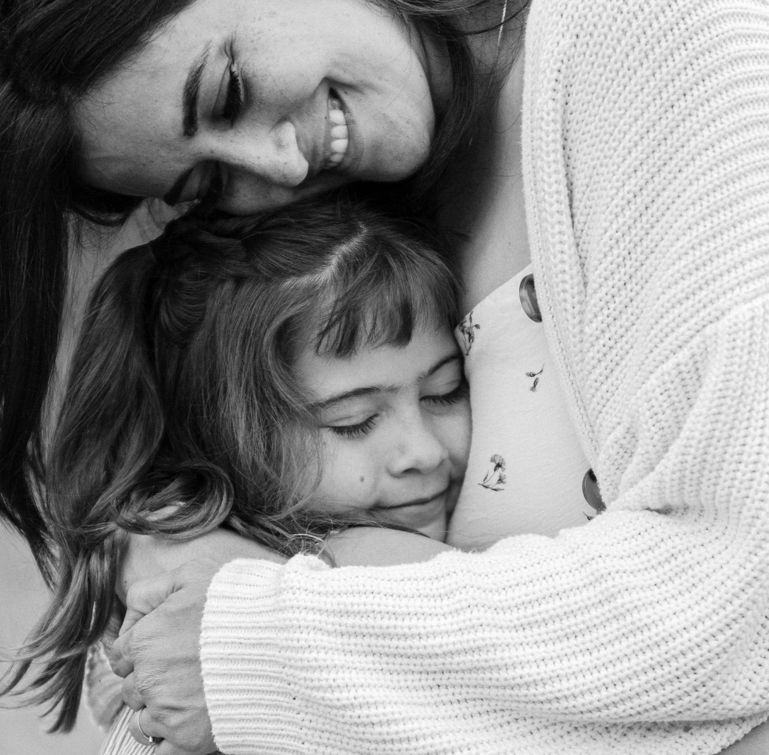mother and daughter hugging