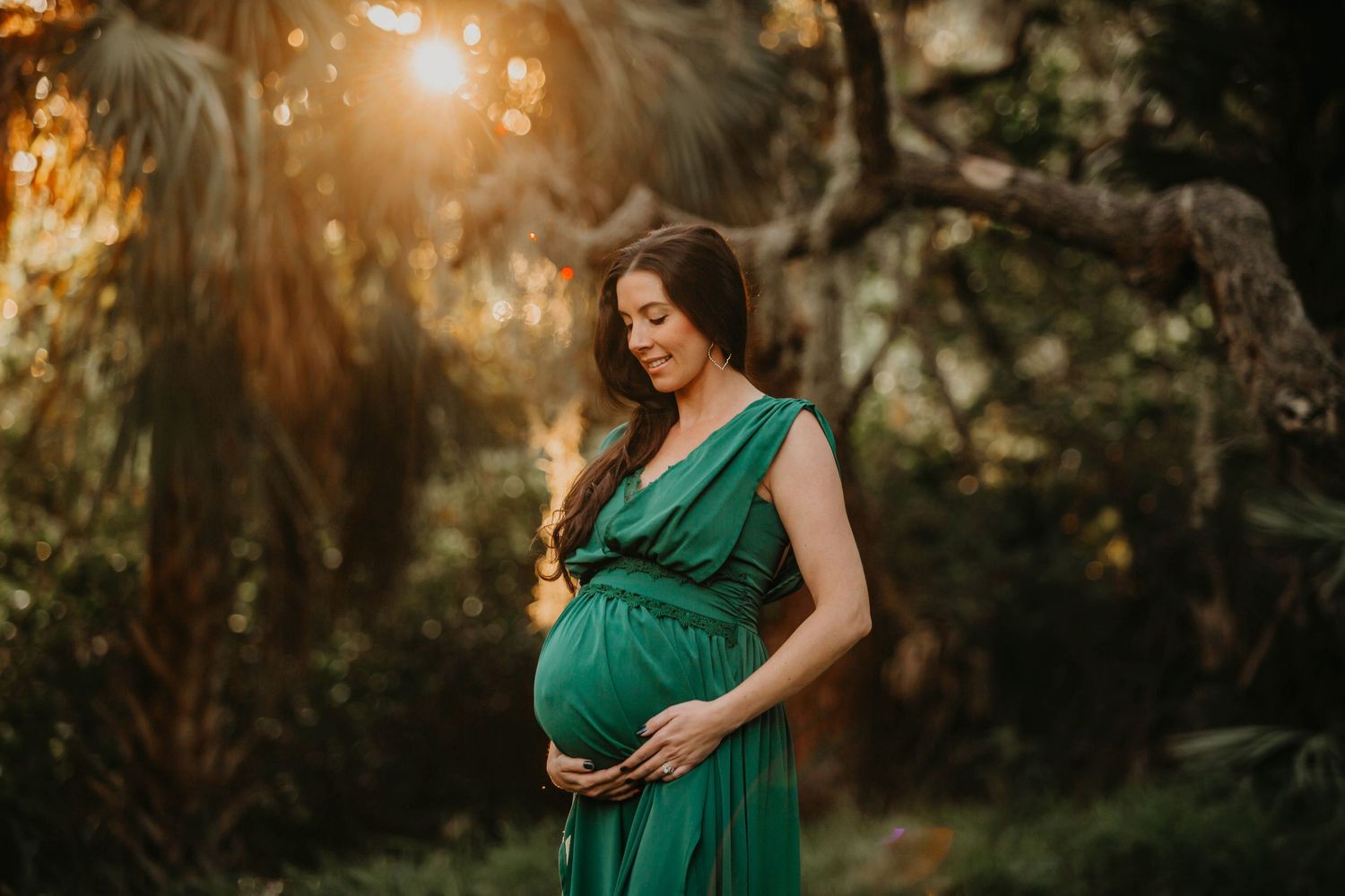 Tarpon Springs Maternity Photography- pregnant woman in green dress