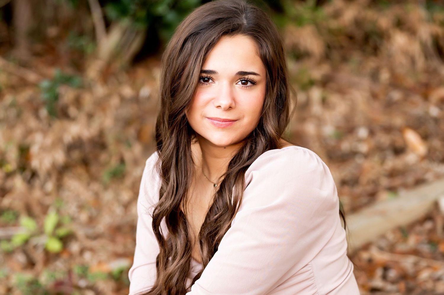 Portrait series in soft lighting showing natural expressions and warm tones.