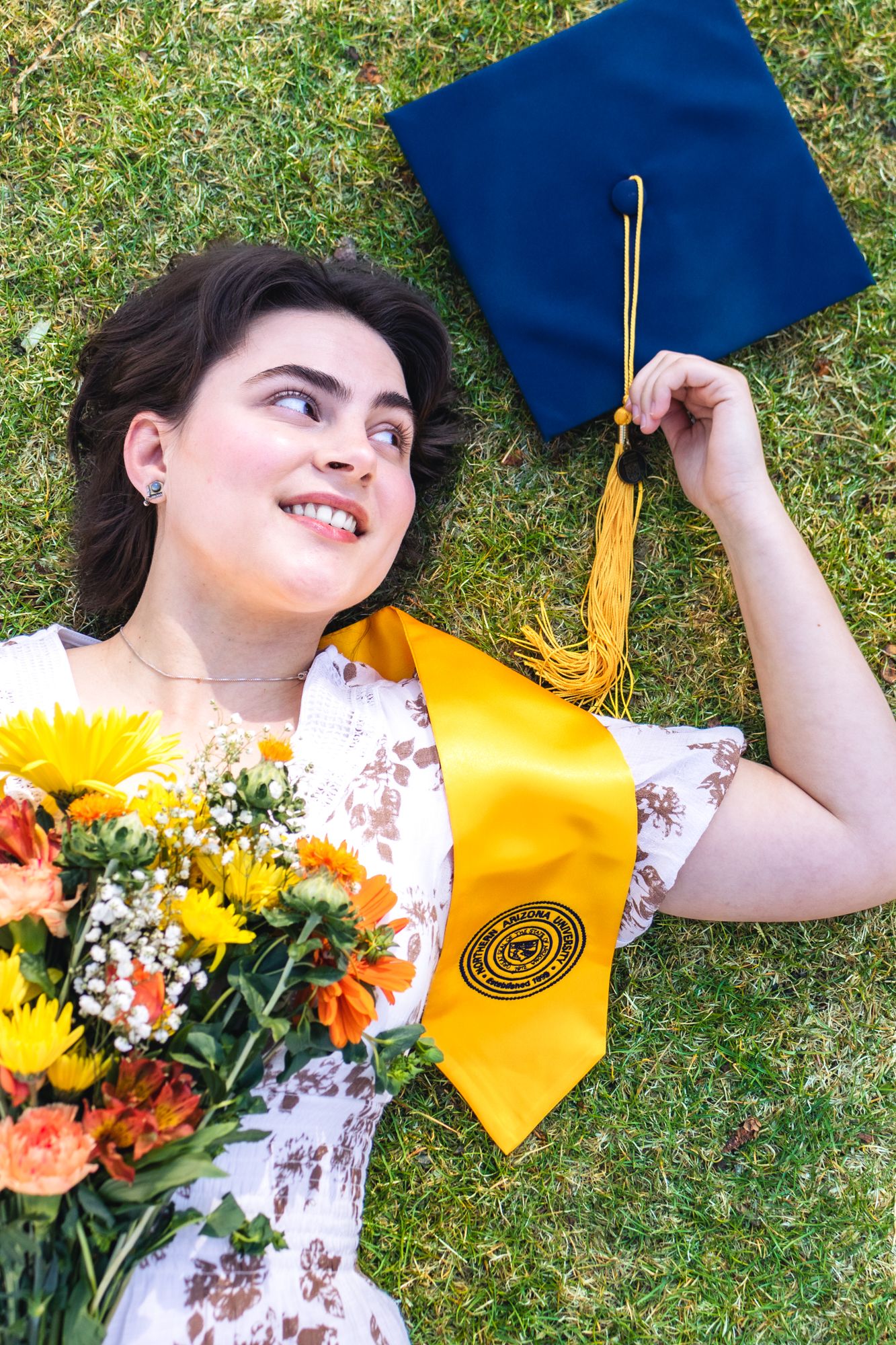 Flowers and Grad Cap grad session