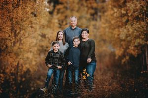 Professional portrait of a family taken in Rock Creek Campground in Monte Vista, Colorado.