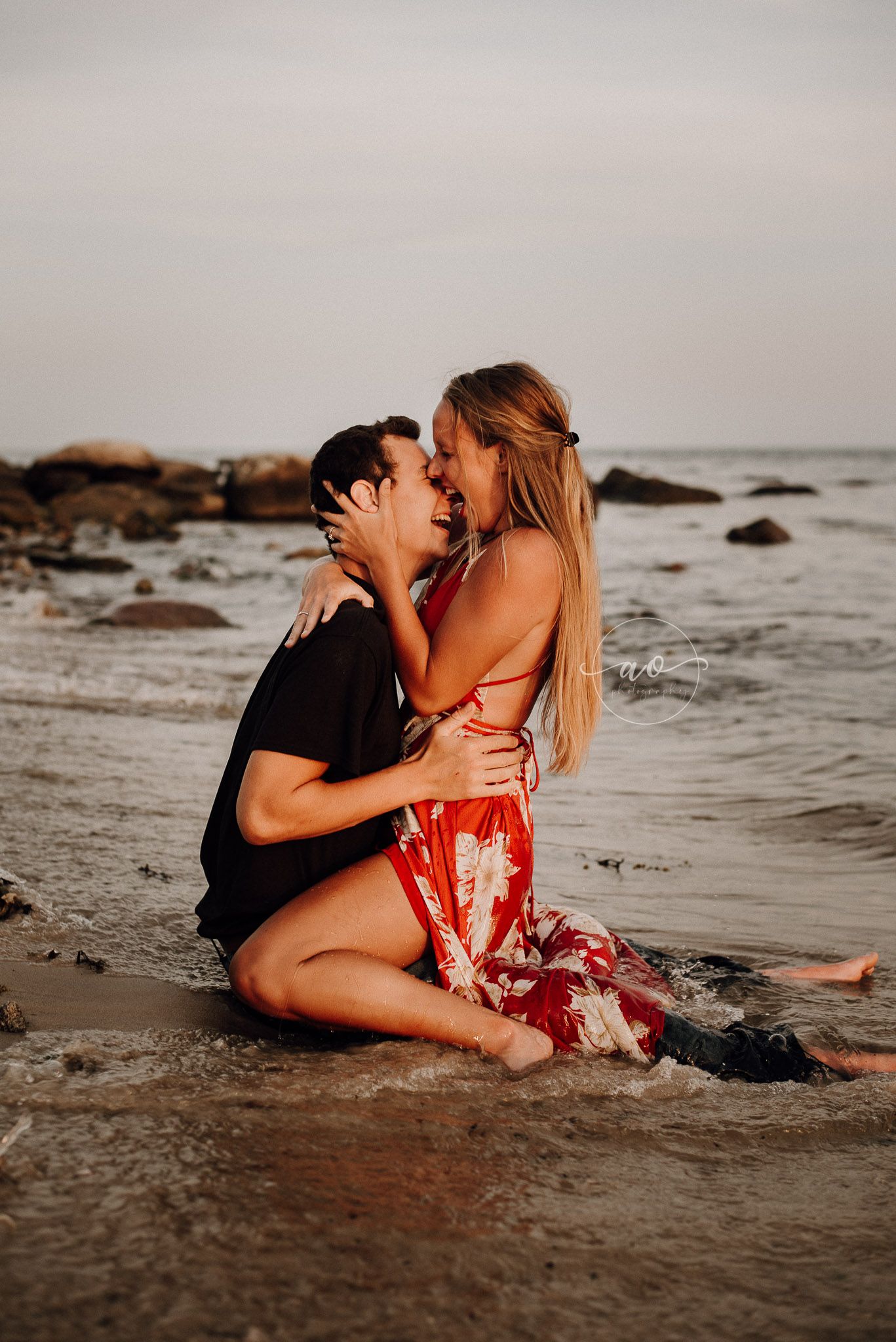 South Eastern CT couple being photographed at local beach.