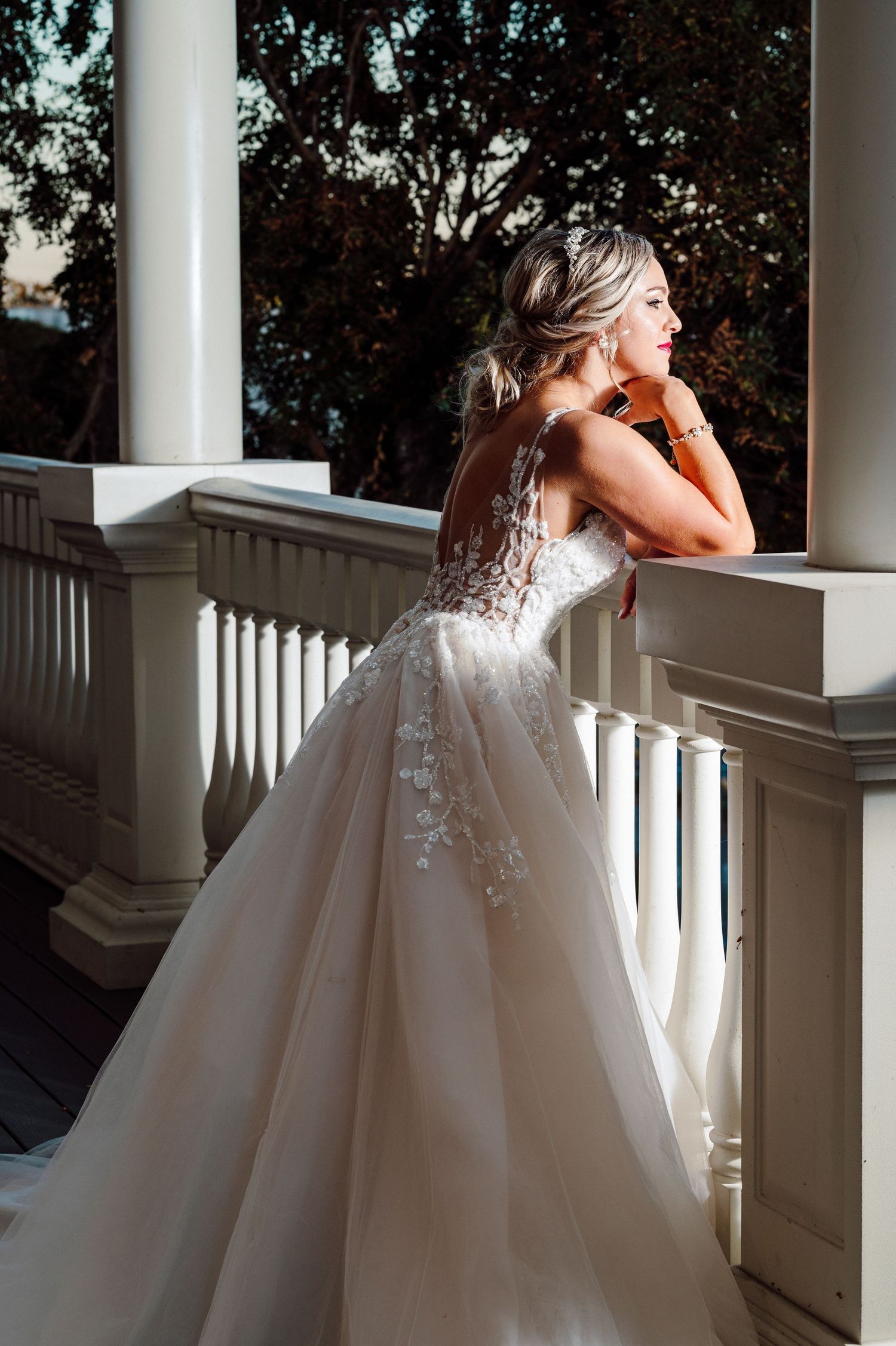 Bride on balcony of The Blanch hotel.