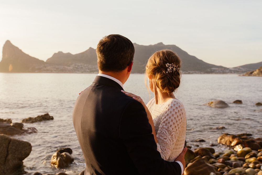 Couple overlooking the bay from Tintswalo Atlantic.