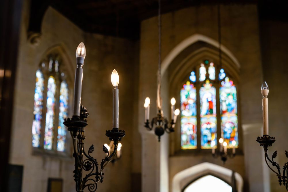 Zara Davis Wedding Photography Sudeley Castle Gloucestershire Cotswolds church at the castle lighting