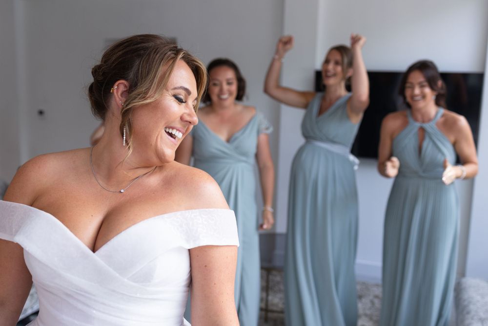 Bride with bridesmaids first look