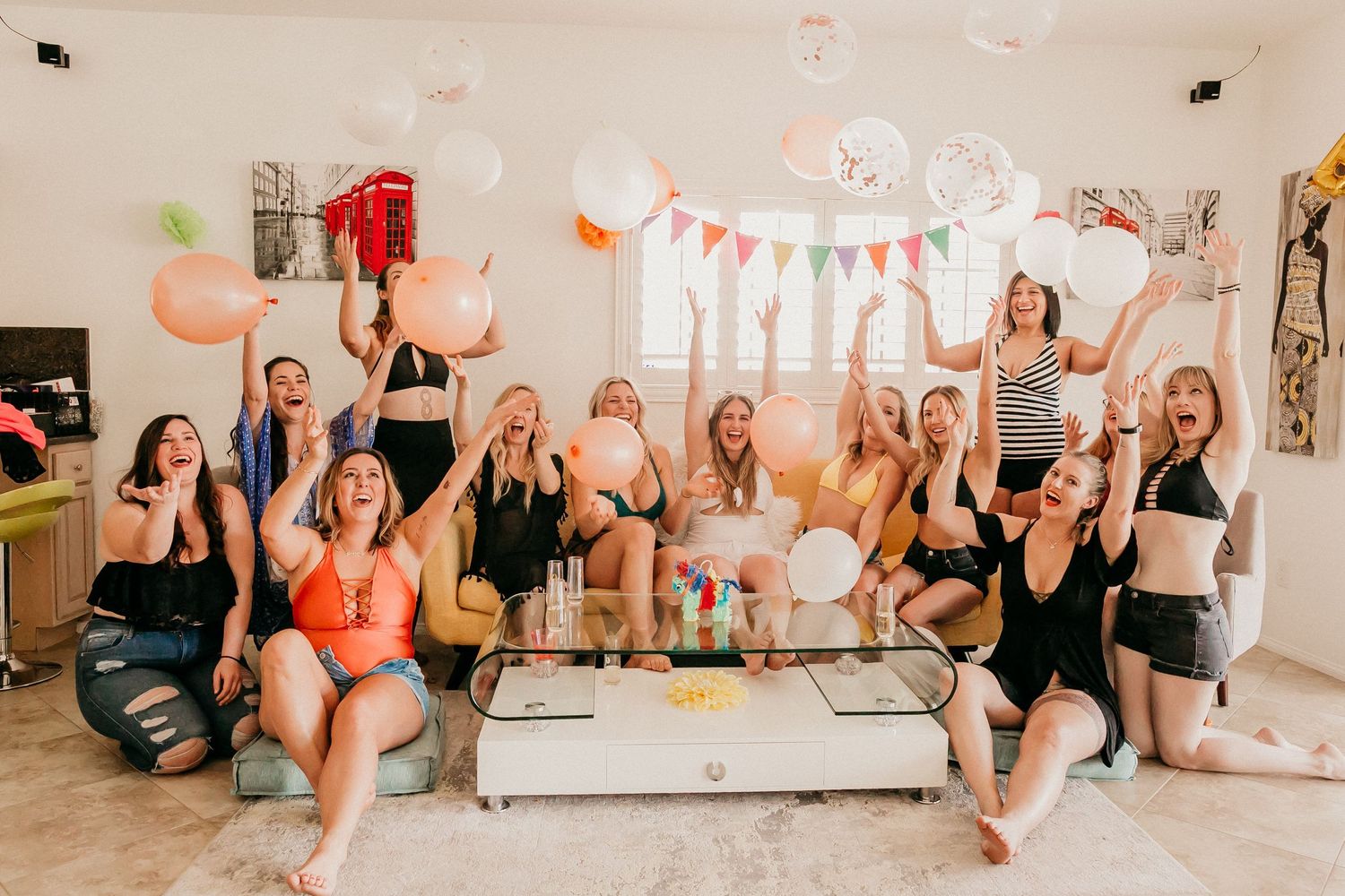 Indoor celebration with party decorations and festive atmosphere.