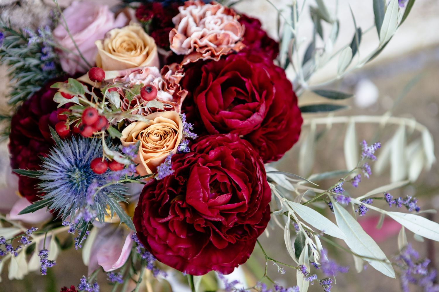 An bright autumn coloured bouquet as prepared by the Lazy Olive.