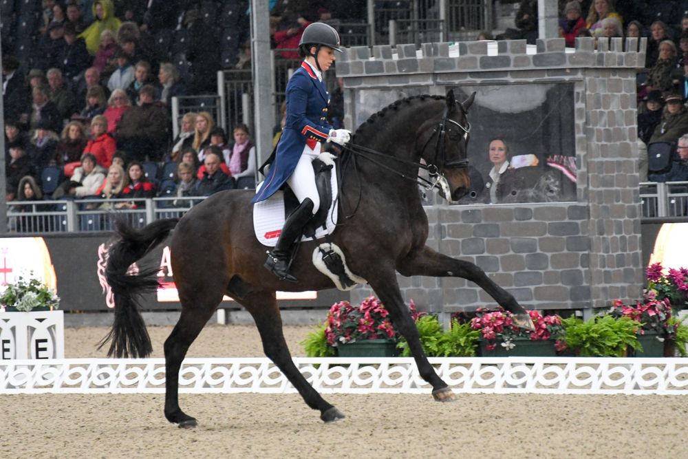 Charlotte Dujardin riding Mount St John Freestyle in the Castle Arena at the Royal Windsor Horse Show, performing a Grand Prix Freestyle