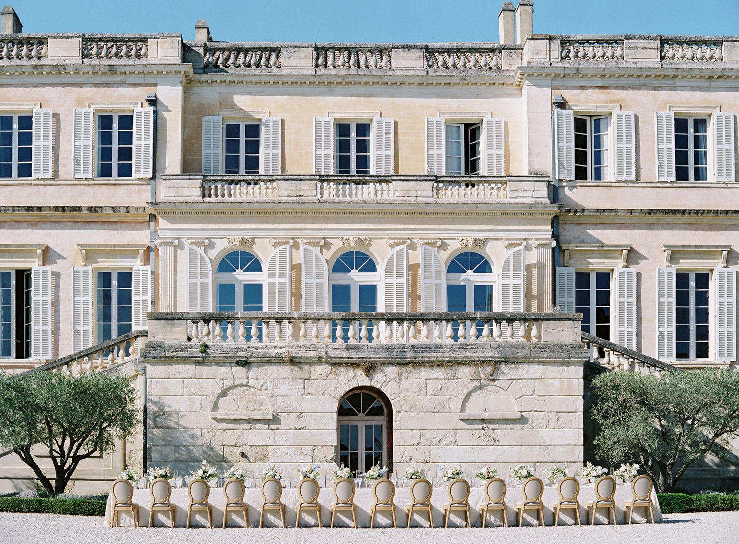 Stunning French colonial mansion with ornate balconies and classic architectural details.