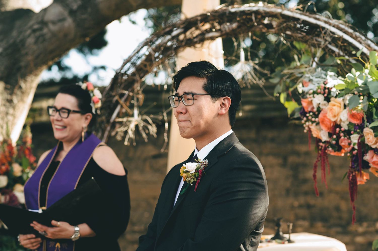 grooms expression as he sees his bride for the first time