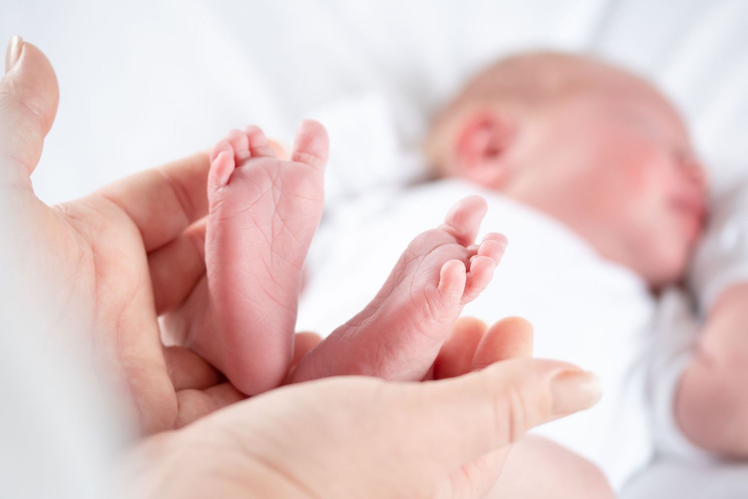 close up of newborn feet