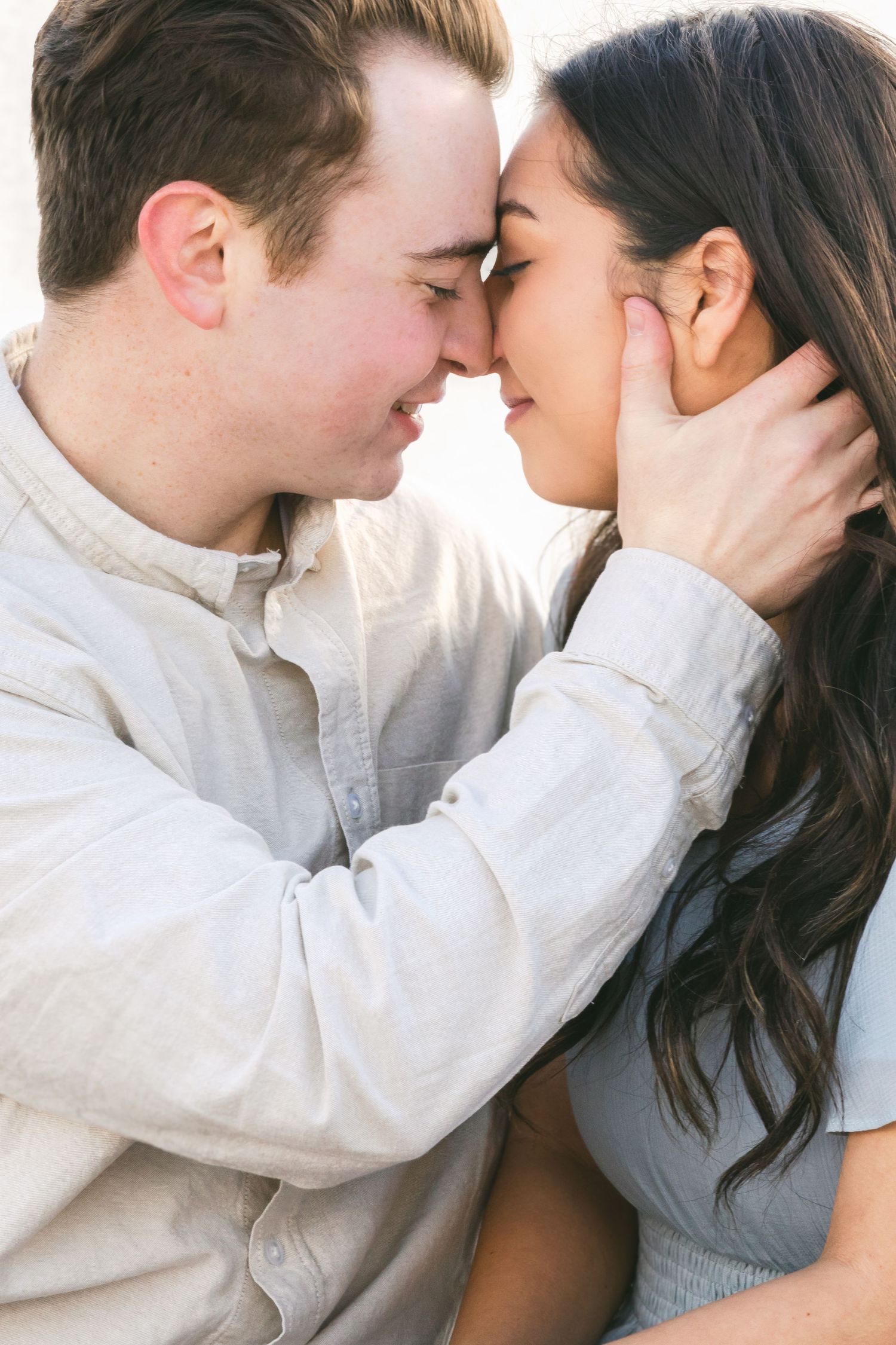 Intimate candid engagement session. The almost kiss me neck grab captured by Chelsee Rawe Photography