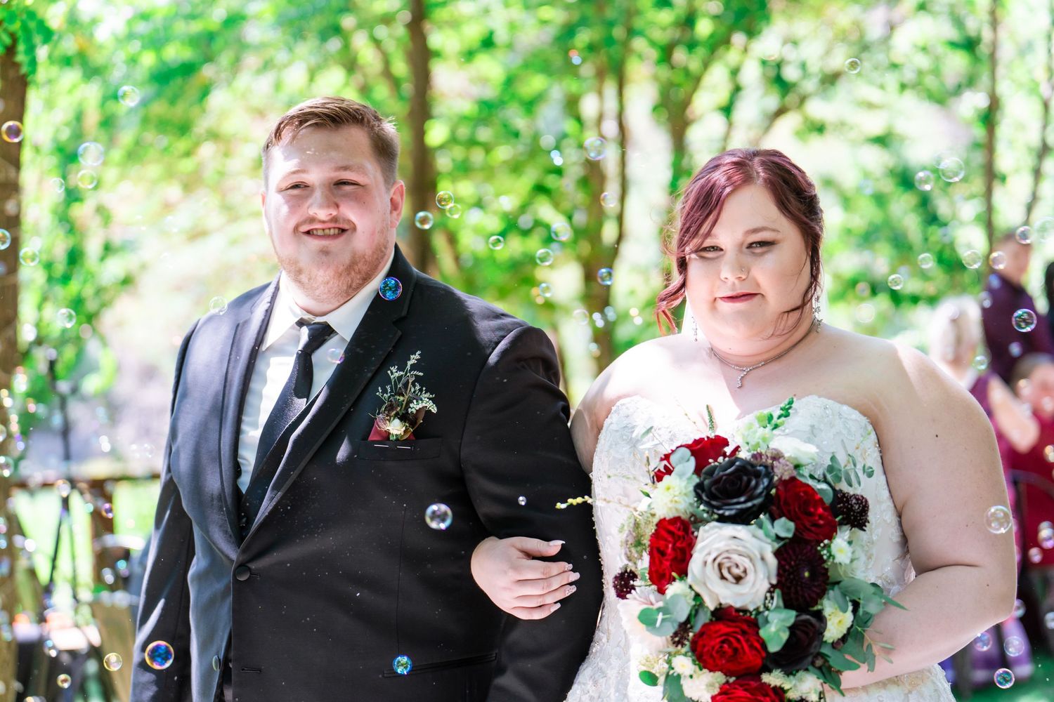 bride and groom exit with bubbles