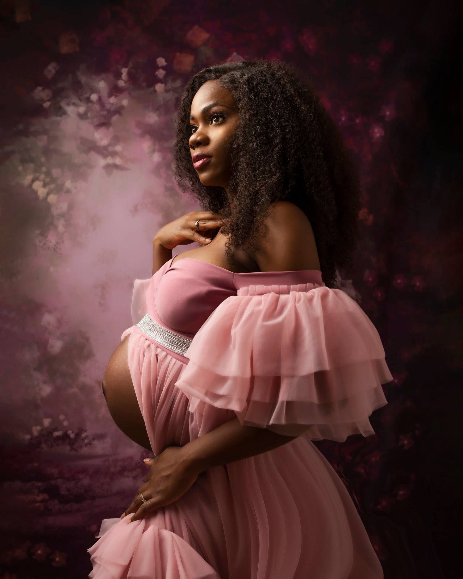 expecting mum in a pink dress maternity portrait photo
