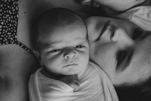 Black and white series of peaceful sleeping moments on soft textiles.