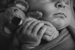 Artistic black and white close-up shots showing gentle touch and texture.