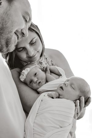 Intimate black and white portrait showcasing tender family moment.