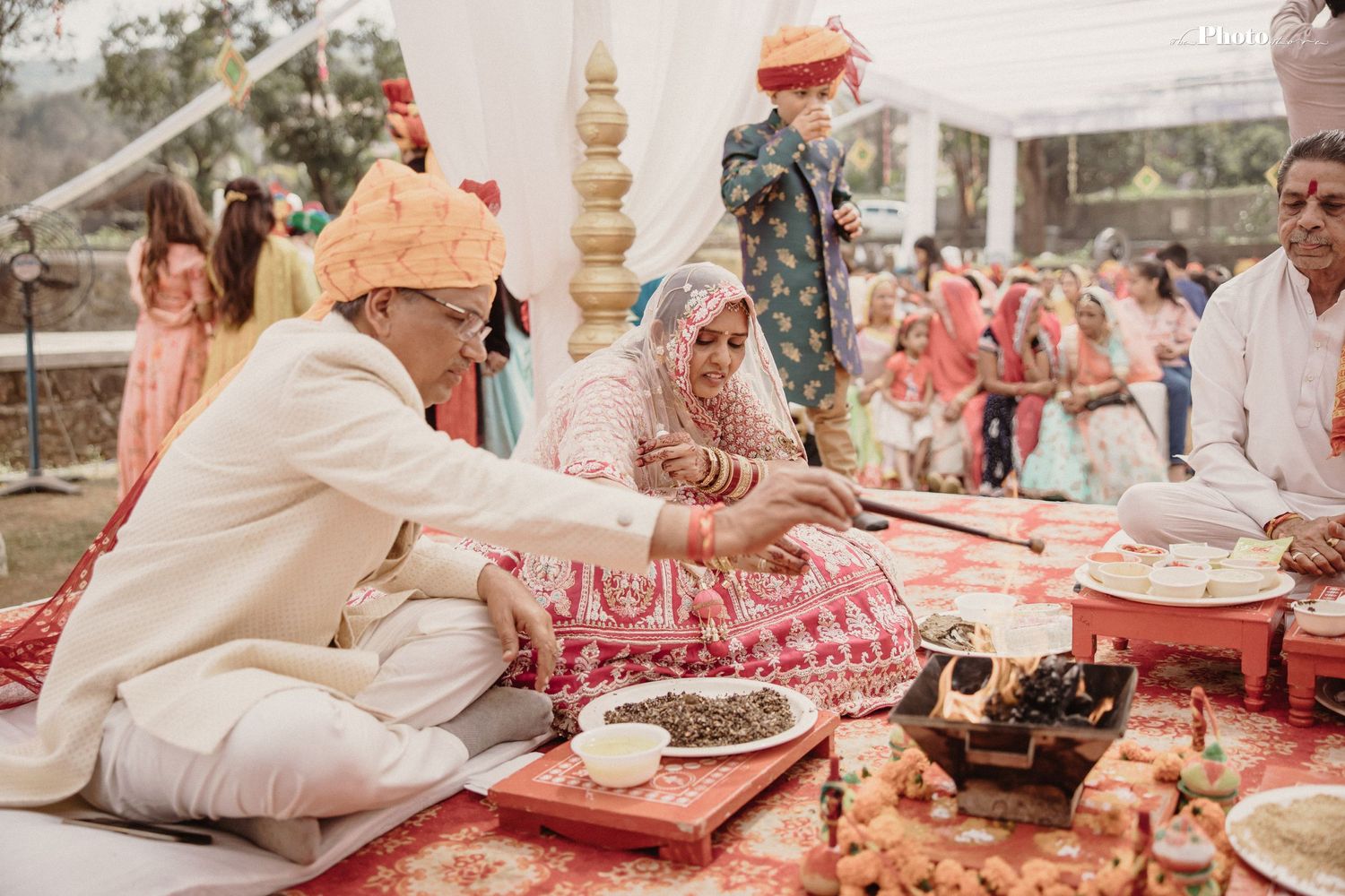Traditional Indian wedding ceremony setup with decorative elements and ritual items.